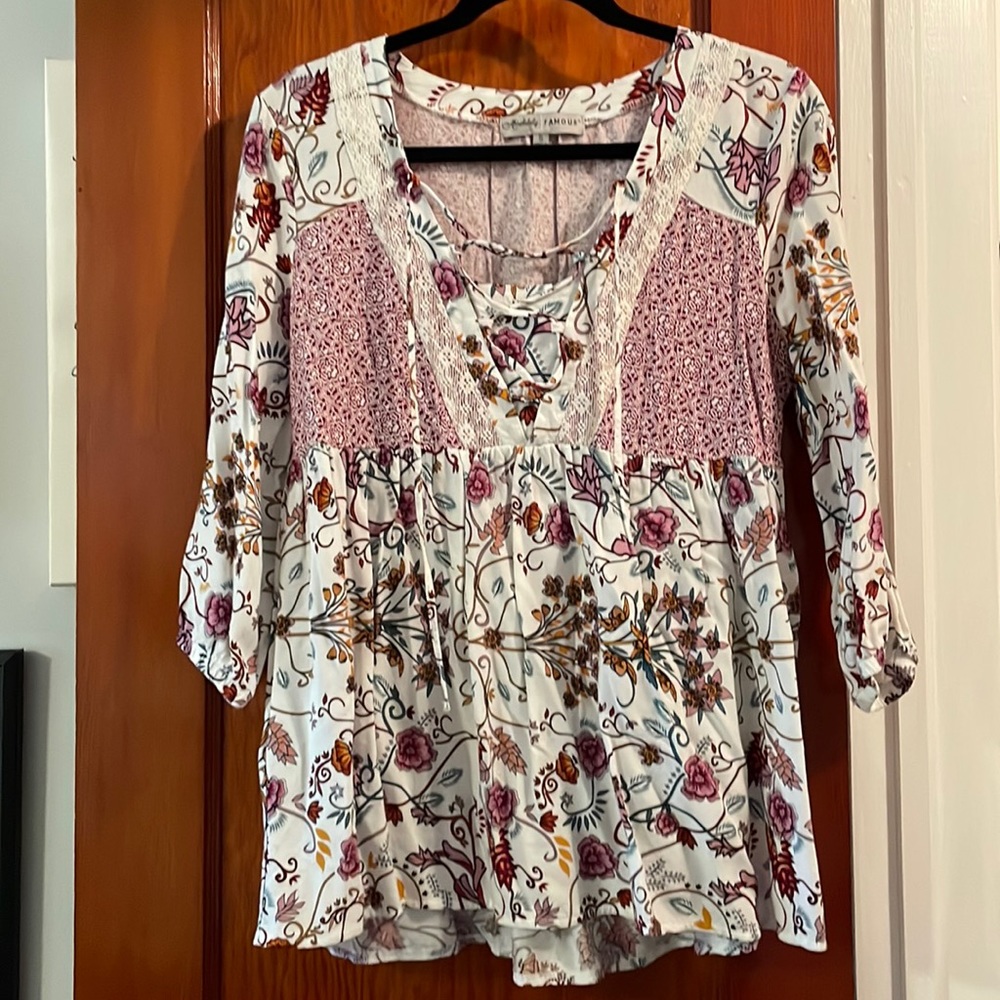 Floral white blouse, tie in the front, good condition, cuffed sleeves, flowy